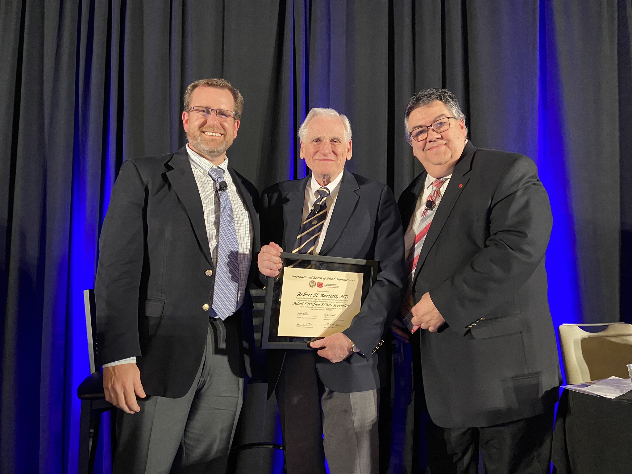 Dr. Bartlett receiving award at AmSECT International Conference